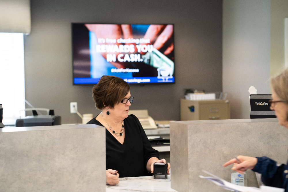 Teller helping a customer