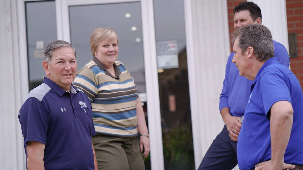 Lending team talking outside